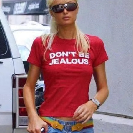 Street Fashion In Paris - Paris Hilton 'don't Be Jealous' Printed